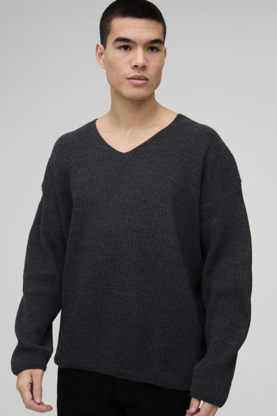 Величезний трикотажний джемпер із запущеними плечима в рубчик із V-подібним вирізом