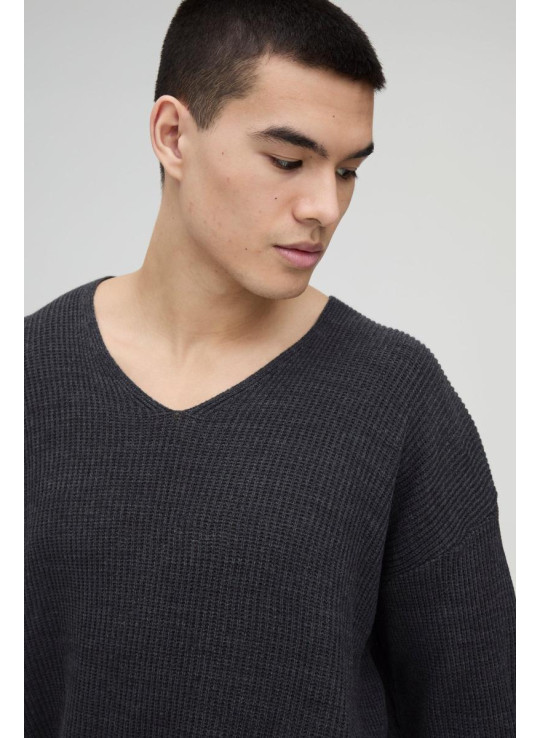 Величезний трикотажний джемпер із запущеними плечима в рубчик із V-подібним вирізом