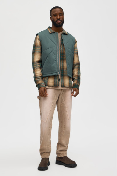 Стьобаний жилет з контрастними вставками