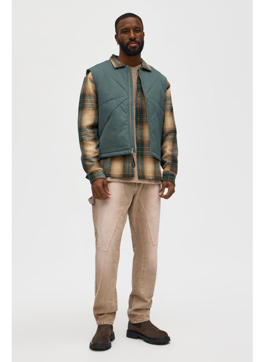 Стьобаний жилет з контрастними вставками