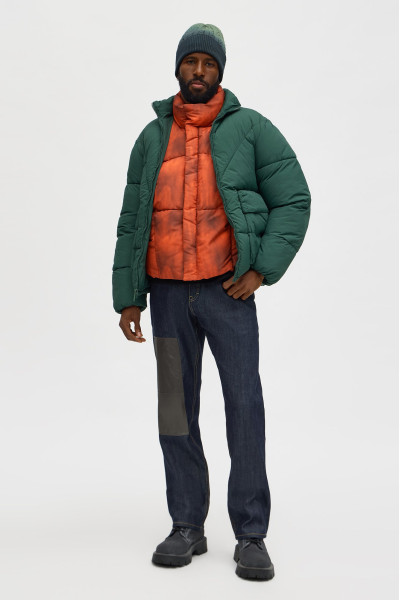 Стьобана куртка-пуфер з кишенями