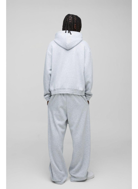 Величезний спортивний костюм із широкими штанинами та гумовим значком із капюшоном