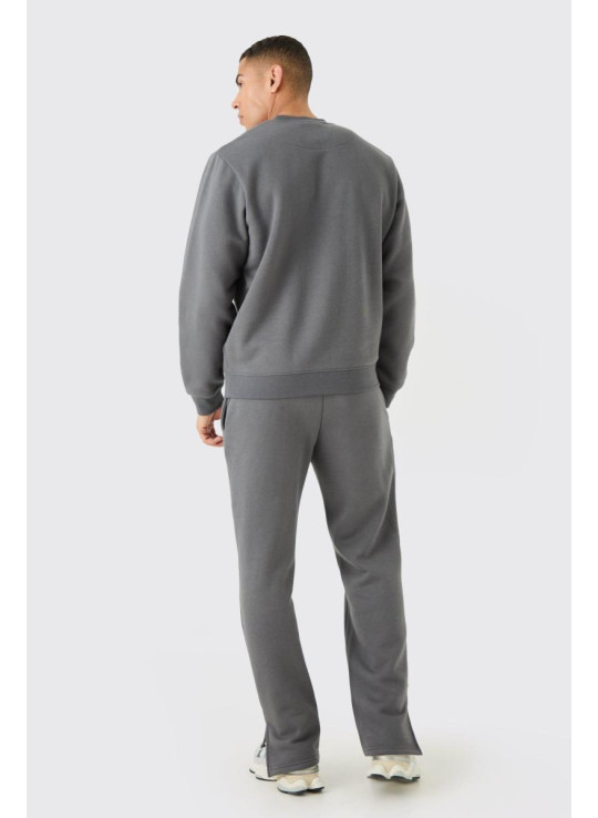 Чоловічий фірмовий спортивний костюм із подовженою горловиною і розділеним подолом