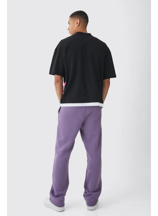 Велика футболка та джоггери зі штучним малюнком